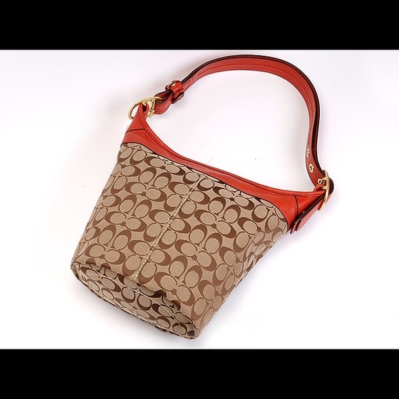 Coach Handbags - Authentic Coach brown signature bag with red trim.