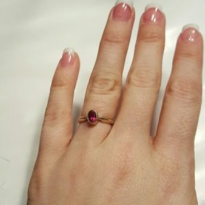 White gold ring with pink stone
