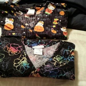 Scrub tops first 2 pics are3xk, 2nd 2 sets are 2xl