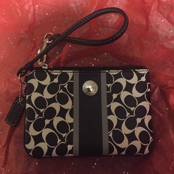 Black and white leather COACH wristlet