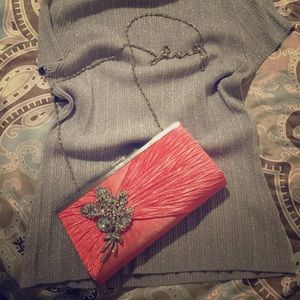 Beautiful pink clutch with silver strap🎉