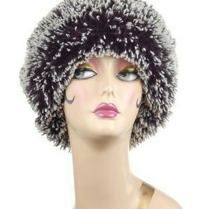 Long-haired faux fur cuffed pillbox hat.
