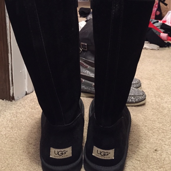 Tall black UGG boots