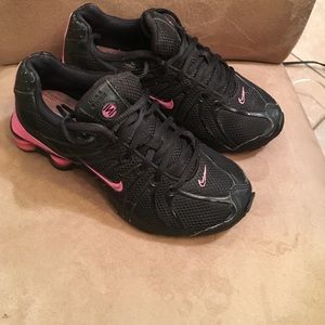 Black and Pink nike shocks