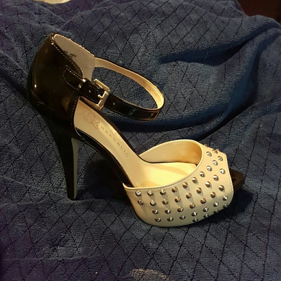 Black and beige heels with spikes