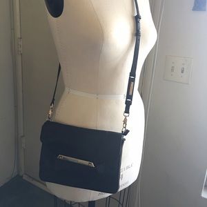 Black sling purse