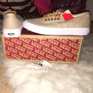 Tan vans with brown laces and white rim. NWT!