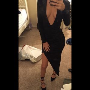 Black low cut, symmetrical dress