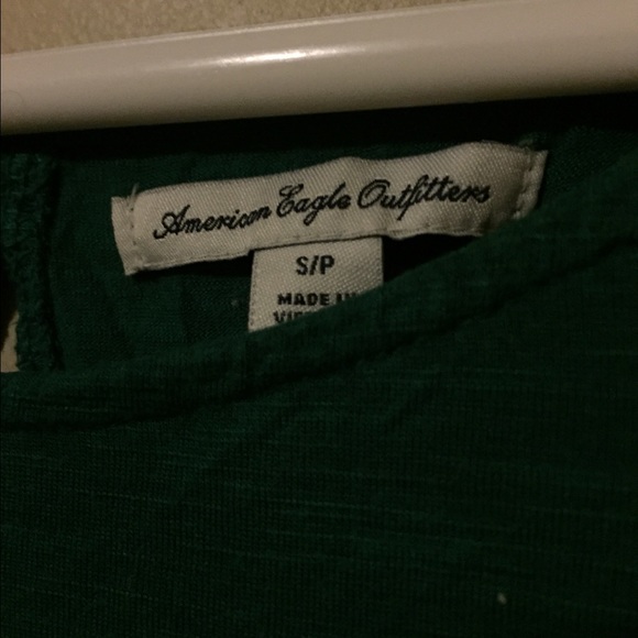 Super cute dark green peplum top - Picture 2 of 3