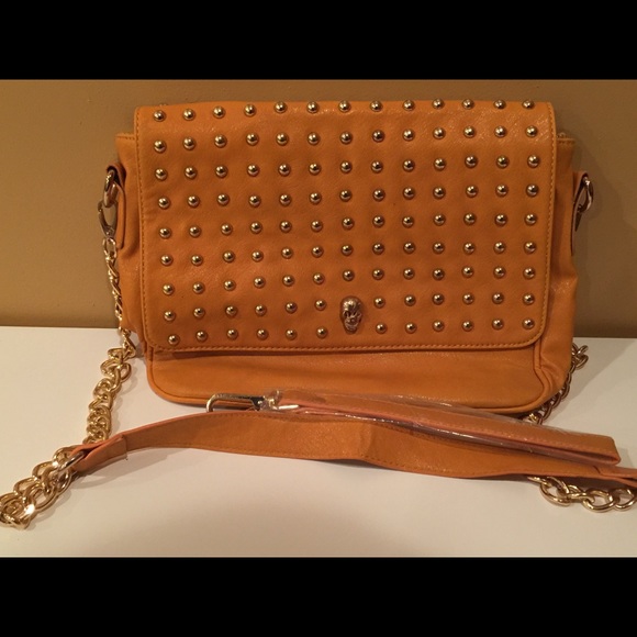 Tarnish/gold/ mustard cross body purse.
