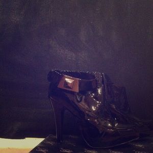 Black patent leather ankle booties