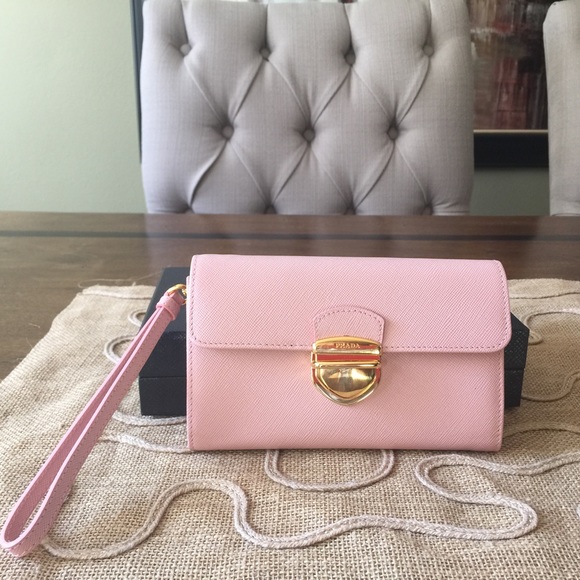 Pink Prada Saffiano Wallet with a hand strap