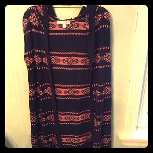 Sleeveless open sweater