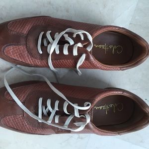 Flat lace ups in brown leather worn once