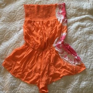 Rip Curl Tie dye peach, pink, and white romper.
