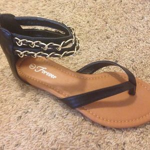 Black and gold gladiator sandals