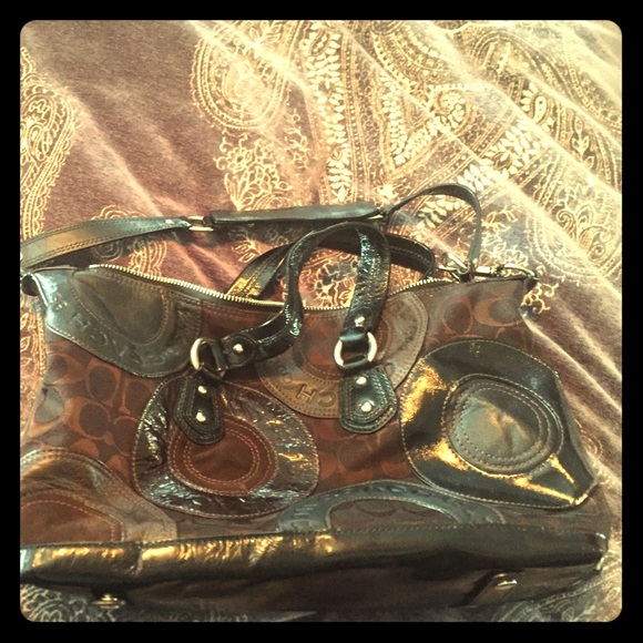 Brown and black Coach purse