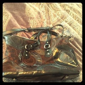 Brown and black Coach purse