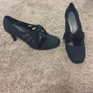 Black high heels with bows