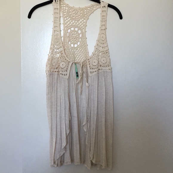 Cream colored crochet shirt/vest.