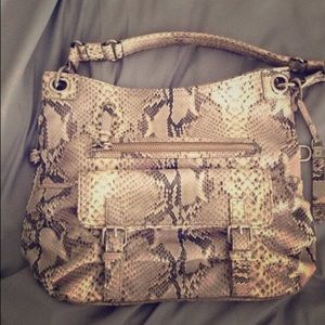 Cole Haan snakeskin purse. In great condition.