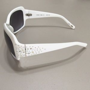 white sunglasses with rhinestones