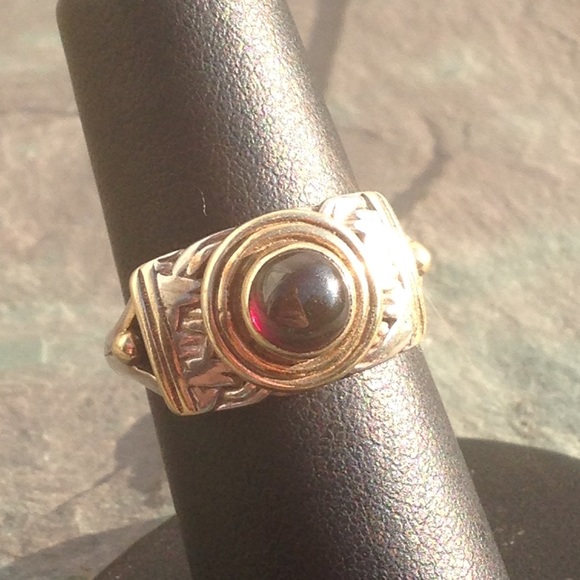 Designer gold silver and garnet ring