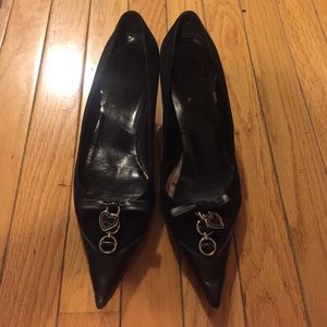 Dior heels with heart charms