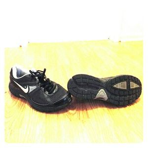 Black and silver Nike sneakers