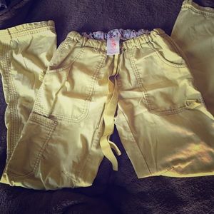 Yellow koi scrub pants