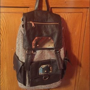 Cooperative brown tweed and leather backpack