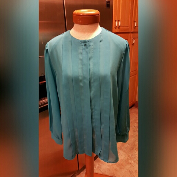 SOLD. SOLD. Diane Von Furstenberg Size 12 Blouse