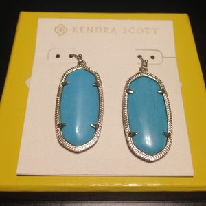 Turquoise and gold Elle Kendra Scott earrings.