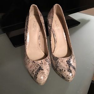 Also snake skin heels