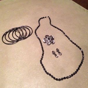 PRICE DROP Black four piece costume jewelry set.