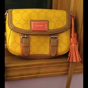 Yellow Nine West Crossbody Purse with tassels