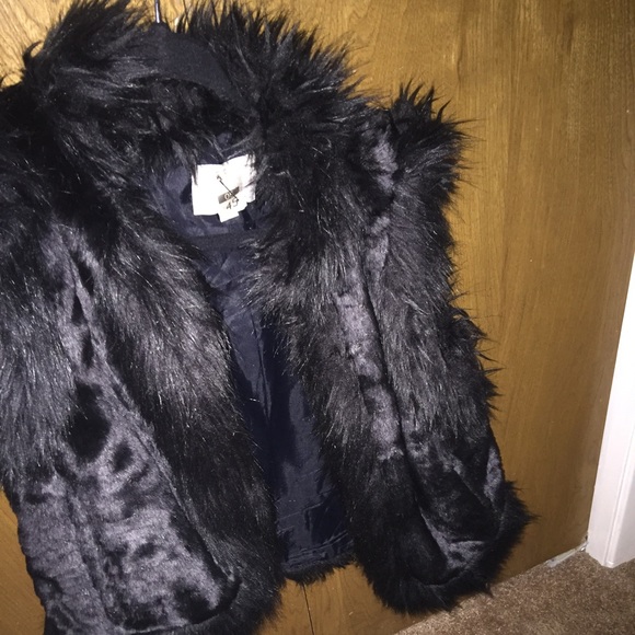 Black faux fur vest