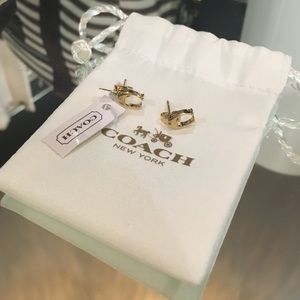 COACH gold earrings