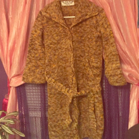 St. John Knits for Arnold Norgaatd belted sweater