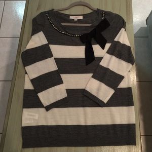 Sweater with rhinestones and bow