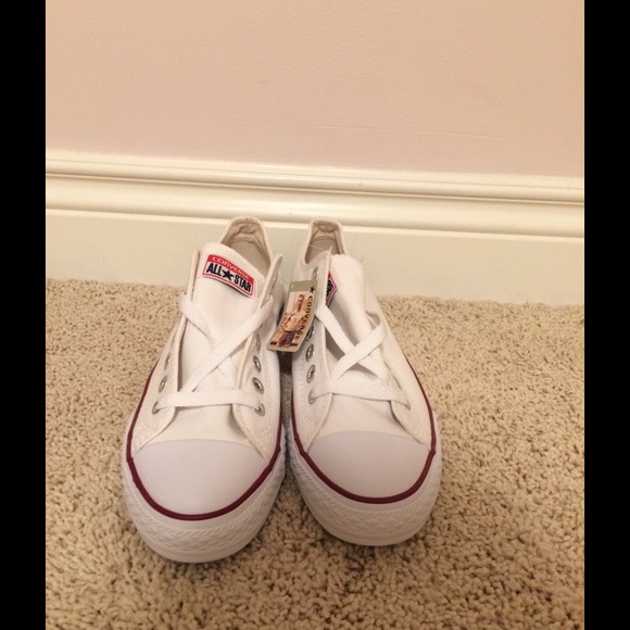 Brand New White low top converse.