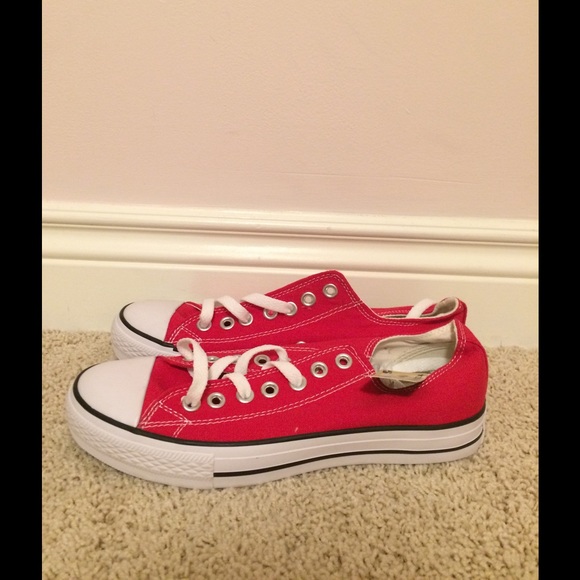 Brand new red low top converse.