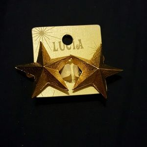 Star shaped clip on earrings