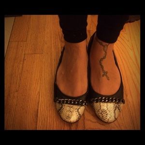 Black flats with chrome & snakeskin accents