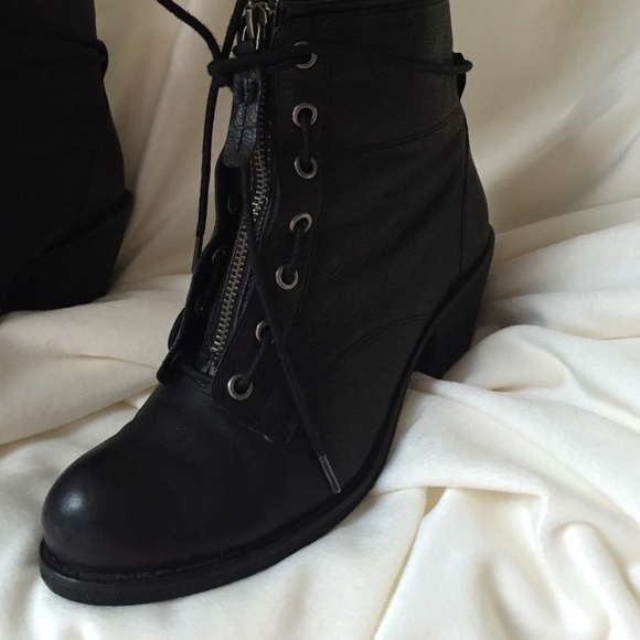 Black ankle tall laced up boots. Size 8.