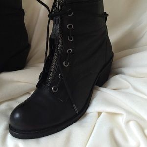 Black ankle tall laced up boots. Size 8.