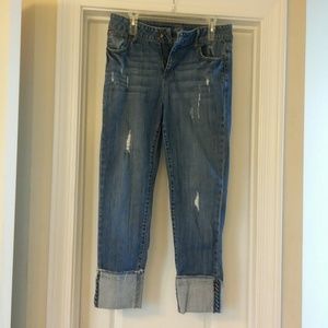 Distressed cropped cuffed stlye jeans