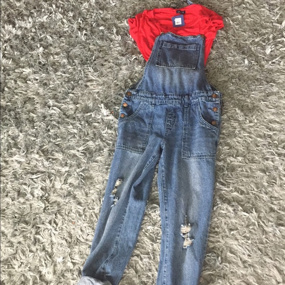 Overalls with rips in the knees