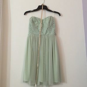 mint dress with a detachable sparkly gold belt