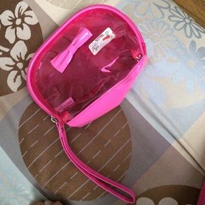 Pink transparent travel bag